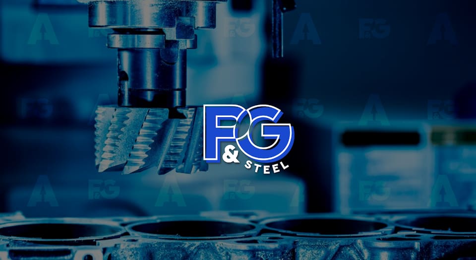 The F&G Steel mark in blue and white, set over a close photograph of a CNC lathe cutting metal.